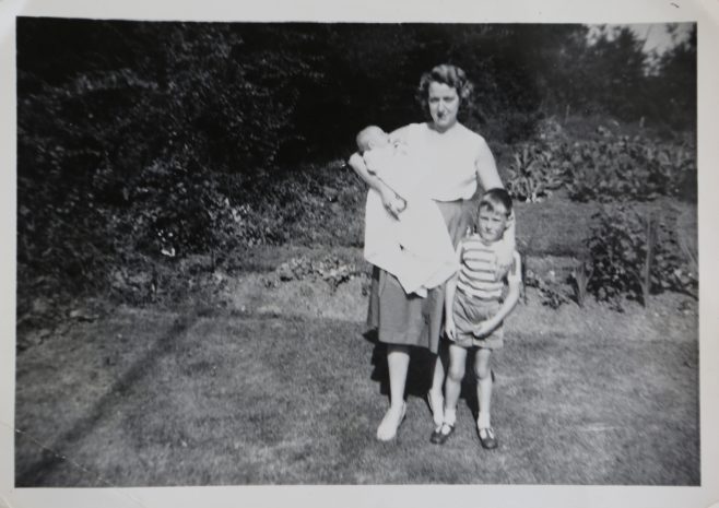 June Kapitan and her two children outside their prefab in Ipswich | Hearn,Jane