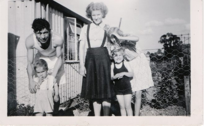 Kathryn, her brother Neal and mum and dad outside their prefab | Hearn, Jane