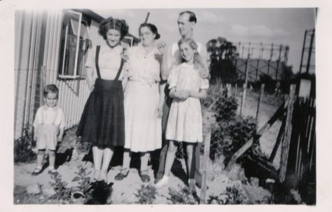 Family group outside the prefabs, Robin Way, St Pauls Cray