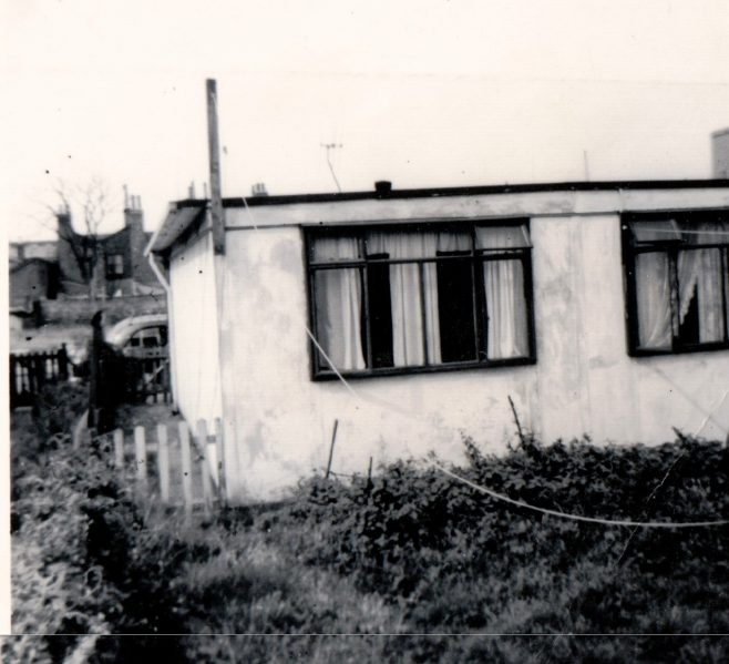 Rear of no. 4 Tooke St shortly after we moved in, in 1955. Dad soon had the garden tidied and the outside painted cream. The windows are of the two bedrooms.