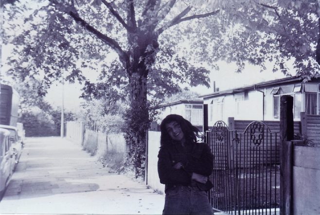 Jo outside the prefabs on St Helens Gardens, London NW10