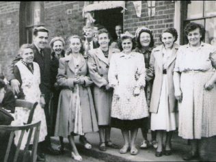 This picture depicts some of the residents of 4 streets at the 1953 Coronation Street Party. | Ray Watts