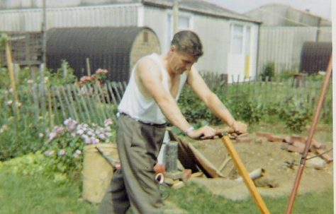 Dad mowing the lawn, 849 Ripple Road