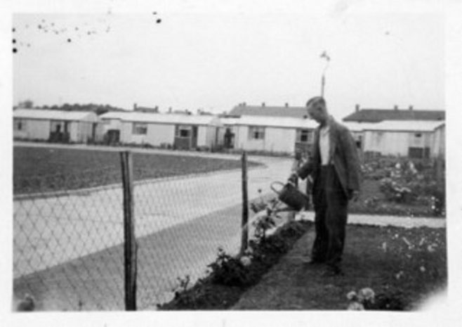 Robert's grandfather Charlie watering the garden, Manford Green, Chigwell | Robert Bourke